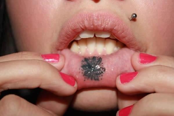 Tattoo on lips inside mouth - Cannabis Culture